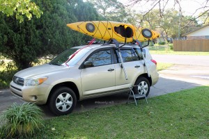 Push kayak into the J-hooks. 